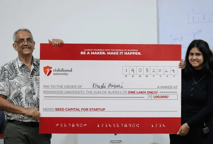 A student founder receiving seed capital for her startup at Rishihood Venture Studio
